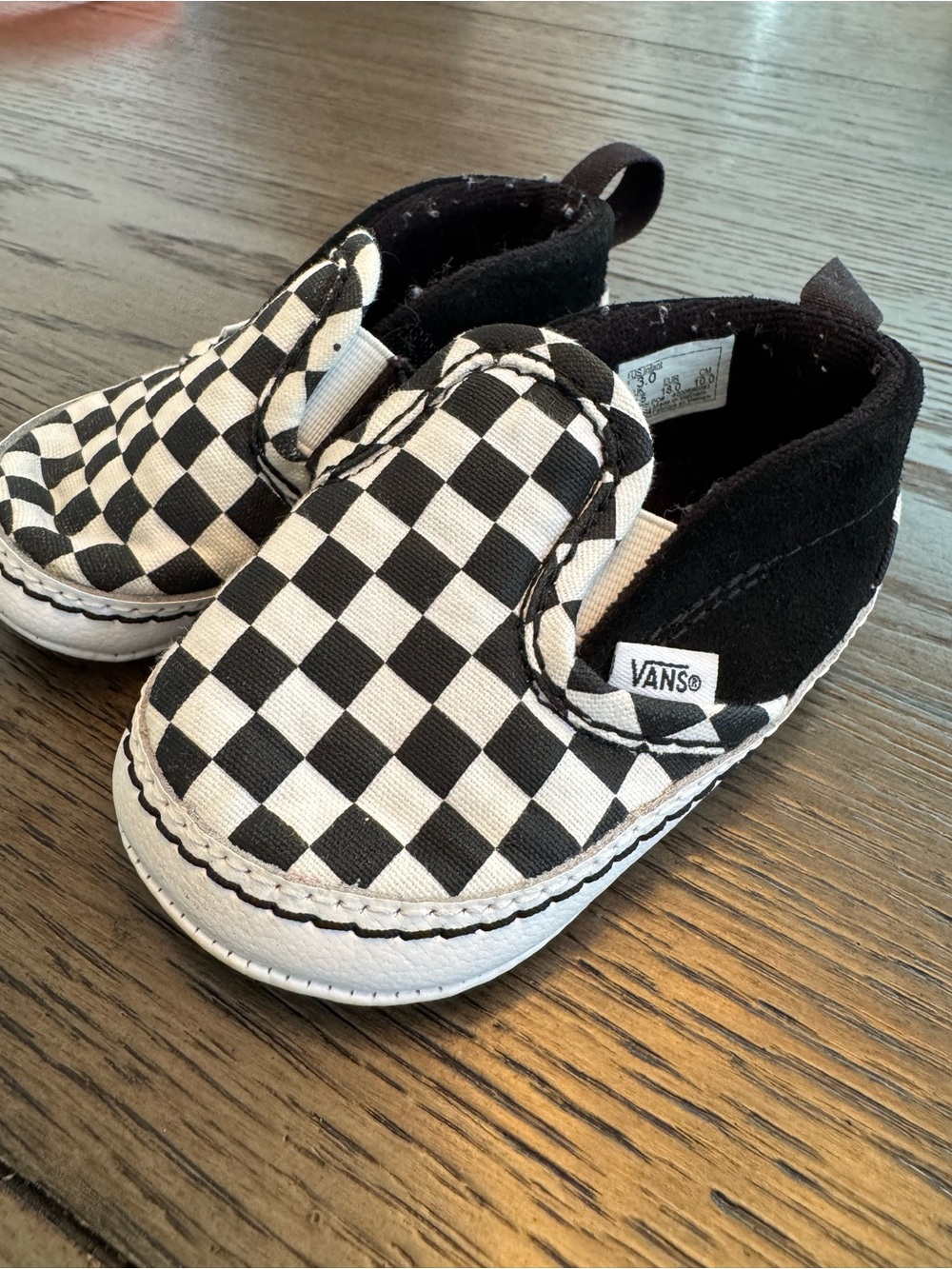 Vans Kids Black & White Checkerboard Slip-On Sneakers